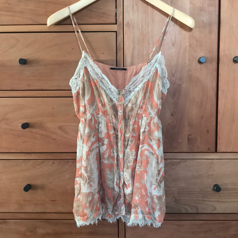 Elie Tahari whimsical top. Beautiful details.